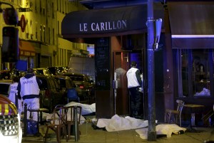 A general view of the scene that shows the covered bodies outside a restaurant following a shooting incident in Paris, France, Nov. 13, 2015.